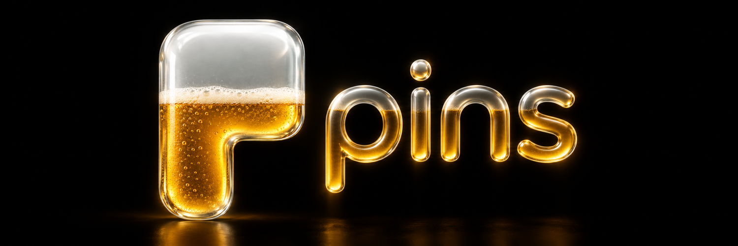PINS glass logo half filled with amber beer